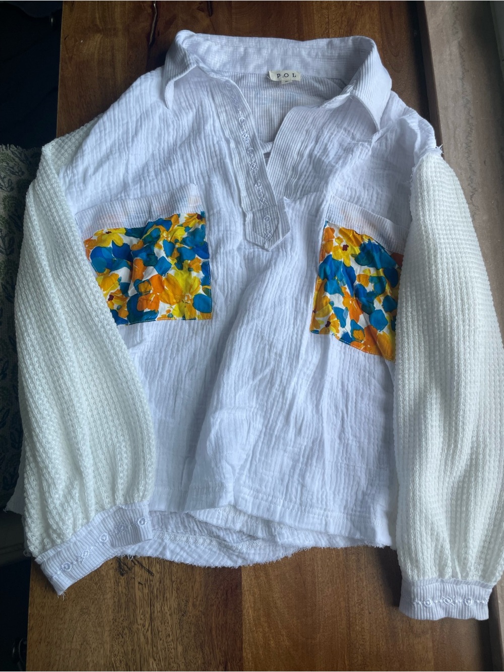POL White Pullover Top with Blue and Yellow Floral Pockets